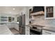 Modern kitchen with stainless steel appliances and quartz countertops at 5012 E Blanche Dr, Scottsdale, AZ 85254