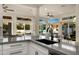 Kitchen features a breakfast bar overlooking the pool and backyard at 5012 E Blanche Dr, Scottsdale, AZ 85254