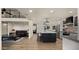 Open concept kitchen with island, and views into the living room at 5012 E Blanche Dr, Scottsdale, AZ 85254