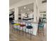 Modern kitchen with island, breakfast bar, and stainless steel appliances at 5012 E Blanche Dr, Scottsdale, AZ 85254