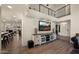 Living room with built-in entertainment center and open floor plan at 5012 E Blanche Dr, Scottsdale, AZ 85254