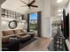 Open living room with sectional sofa and views to backyard at 5012 E Blanche Dr, Scottsdale, AZ 85254