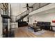 Living area with fireplace, high ceilings, and lofted area at 5012 E Blanche Dr, Scottsdale, AZ 85254