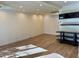 Open living room with wood floors, bright lighting, and plenty of open space at 5012 E Blanche Dr, Scottsdale, AZ 85254
