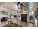 Spacious living room with a fireplace and open floor plan at 5012 E Blanche Dr, Scottsdale, AZ 85254