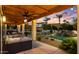 Relaxing covered patio overlooking the pool and backyard at 5012 E Blanche Dr, Scottsdale, AZ 85254