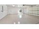 Bright and spacious garage with epoxy floor and extra storage at 5341 E Windsong St, Apache Junction, AZ 85119