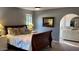 Bedroom with en-suite bathroom and hardwood floors at 5345 E Evans Dr, Scottsdale, AZ 85254