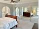 Spacious primary bedroom with mirrored closet and ensuite bathroom at 5345 E Evans Dr, Scottsdale, AZ 85254