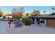 Brick paver driveway and walkway leading to a charming ranch home at 5345 E Evans Dr, Scottsdale, AZ 85254