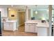 Modern kitchen with white cabinets and stainless steel appliances at 5345 E Evans Dr, Scottsdale, AZ 85254