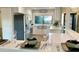 Modern kitchen features stainless steel appliances and white cabinetry at 5345 E Evans Dr, Scottsdale, AZ 85254