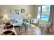 Living room with pool view, comfy seating, and hardwood floors at 5345 E Evans Dr, Scottsdale, AZ 85254