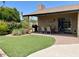 Patio with seating area, grill, and artificial turf at 5345 E Evans Dr, Scottsdale, AZ 85254