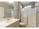 Clean bathroom with walk-in shower and modern vanity at 5660 N 188Th Ln, Litchfield Park, AZ 85340
