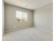 Well-lit bedroom with carpet and mountain views at 5660 N 188Th Ln, Litchfield Park, AZ 85340