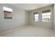 Spacious bedroom with neutral walls and carpet at 5660 N 188Th Ln, Litchfield Park, AZ 85340
