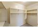 Spacious closet with double hanging rods and shelving at 5660 N 188Th Ln, Litchfield Park, AZ 85340