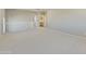 Open loft area with carpeted floor and access to bathroom at 5660 N 188Th Ln, Litchfield Park, AZ 85340