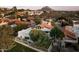 Aerial view of house and surrounding community, mountain backdrop at 6184 N 28Th Pl, Phoenix, AZ 85016