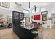 Modern kitchen with dark cabinetry and granite countertops at 6184 N 28Th Pl, Phoenix, AZ 85016