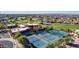 Aerial view of tennis courts and clubhouse at 6334 E Viewmont Dr # 5, Mesa, AZ 85215