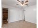 Bedroom with bathroom access and tile floors at 708 E Garnet Ave, Mesa, AZ 85204