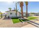 Updated mid-century home with artificial turf lawn at 8311 E Angus Dr, Scottsdale, AZ 85251