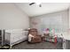 Charming Bedroom, complete with crib and comfortable seating at 921 W University Dr # 1136, Mesa, AZ 85201