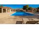 Inviting community pool with lounge chairs at 921 W University Dr # 1136, Mesa, AZ 85201