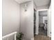 Clean hallway with access to laundry and bedrooms at 921 W University Dr # 1136, Mesa, AZ 85201