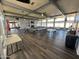 Spacious community room with tables and chairs at 9501 E Broadway Rd # 107, Mesa, AZ 85208