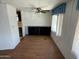 Dining area with wood-look floors and cabinet at 9501 E Broadway Rd # 107, Mesa, AZ 85208