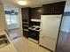 Bright kitchen boasting gas range, built-in oven, and refrigerator at 9501 E Broadway Rd # 107, Mesa, AZ 85208