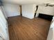 Spacious living room with wood-look floors at 9501 E Broadway Rd # 107, Mesa, AZ 85208