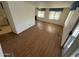 Living room with wood-look floors at 9501 E Broadway Rd # 107, Mesa, AZ 85208