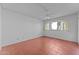 Bedroom with tile floors and large window at 100 N Vulture Mine Rd # 101, Wickenburg, AZ 85390