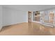 Bright living room with wood floors and view into kitchen at 100 N Vulture Mine Rd # 101, Wickenburg, AZ 85390