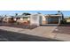 Single story home with brick and painted siding at 10620 W Clair Dr, Sun City, AZ 85351