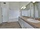 Bathroom with double vanity, tub and shower, and tile floors at 10934 E Becker Ln, Scottsdale, AZ 85259