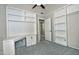 Bedroom with built-in shelves and extra closet space at 10934 E Becker Ln, Scottsdale, AZ 85259