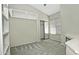 Bedroom with built-in shelves, closet, and window at 10934 E Becker Ln, Scottsdale, AZ 85259