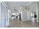 Open kitchen features tile floors and a view into the adjacent living room at 10934 E Becker Ln, Scottsdale, AZ 85259