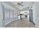 Kitchen with white cabinets, tile floor, and a breakfast nook at 10934 E Becker Ln, Scottsdale, AZ 85259