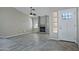 Living room with fireplace, wood-look floors, and high ceilings at 10934 E Becker Ln, Scottsdale, AZ 85259