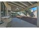 Covered patio with ceiling fan and view of backyard at 10934 E Becker Ln, Scottsdale, AZ 85259