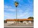 Single-story home with a terracotta tile roof and a landscaped front yard at 11022 W Boswell Blvd, Sun City, AZ 85373