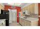 Kitchen features light wood cabinets and a black stove top at 11022 W Boswell Blvd, Sun City, AZ 85373