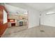 Open concept kitchen with a view of the dining area at 11022 W Boswell Blvd, Sun City, AZ 85373