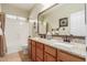 Bathroom with double vanity and granite countertop at 11122 N 165Th Ave, Surprise, AZ 85388